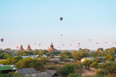 Hot air balloons against sky