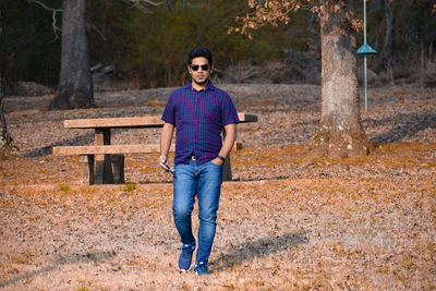 Portrait of man standing on ground