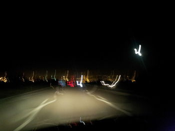 Light trails on road at night