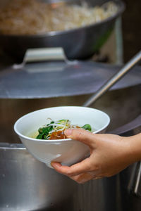 Midsection of woman preparing food