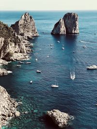 High angle view of rocks in sea