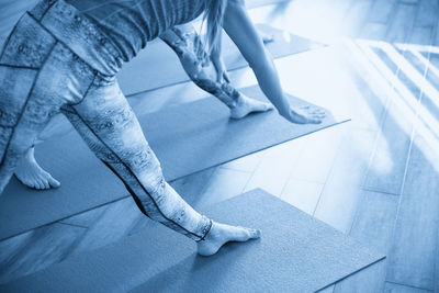 Low section of woman standing on floor