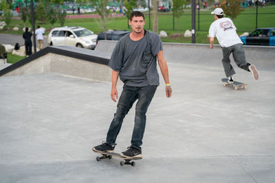 Full length of man skateboarding on skateboard