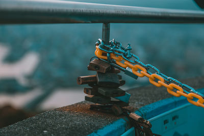 Close-up of ropes on railing