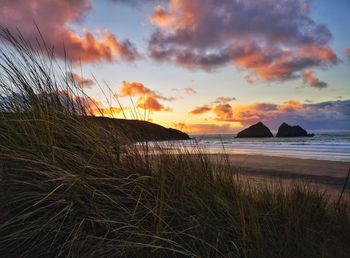 Scenic view of sea against sky during sunset