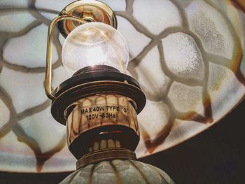 Low angle view of illuminated light bulb