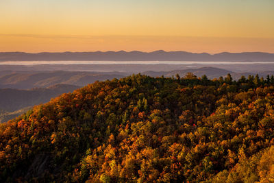 Scenic view of mountains during sunset in autumn