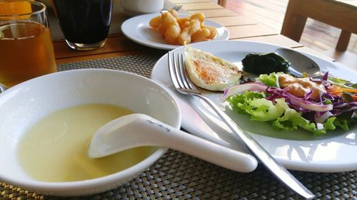 Close-up of breakfast served on table