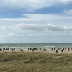 Scenic view of beach against sky