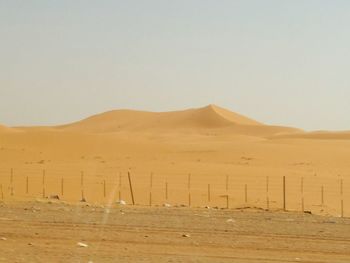 Scenic view of desert against sky