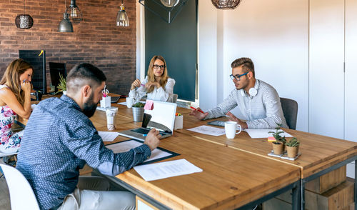 Group of people working on table