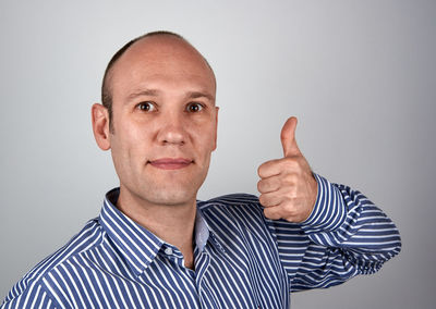 Portrait of man against white background