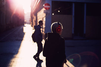 People standing on street in city