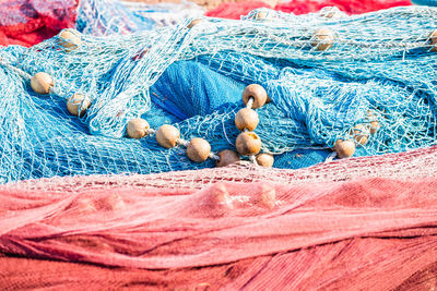 Close-up of fishing net on beach