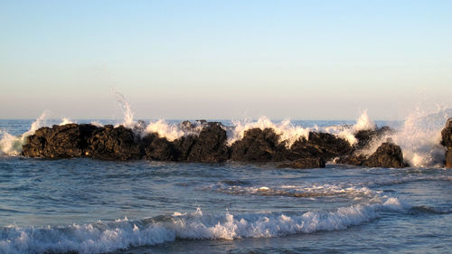 Scenic view of sea against clear sky