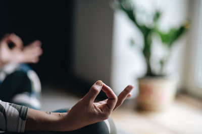 Midsection of woman using mobile phone