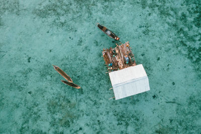High angle view of a boat floating on sea