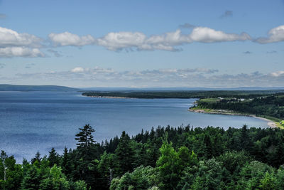 Scenic view of sea against cloudy sky