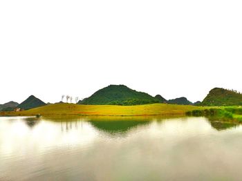 Scenic view of lake against clear sky
