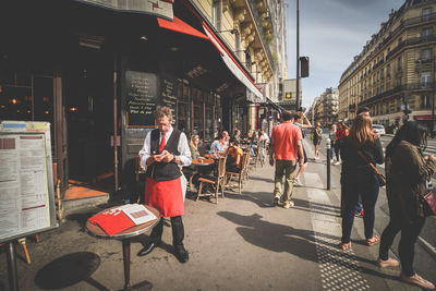 People on street in city