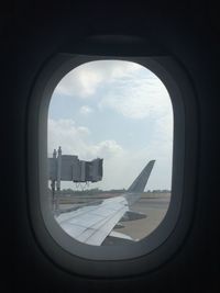 View of residential buildings seen through train window