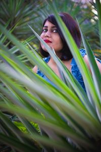 Portrait of young woman looking away