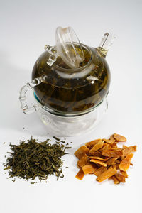 High angle view of tea on table against white background