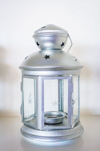 Close-up of jar on table at home