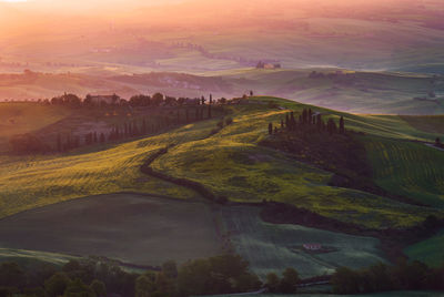 Scenic view of landscape against sky during sunset