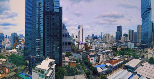 High angle view of buildings in city against sky