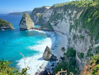 Panoramic view of sea and rock formation against sky