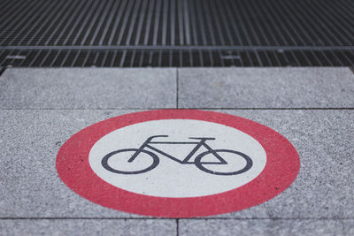 High angle view of bicycle sign on road