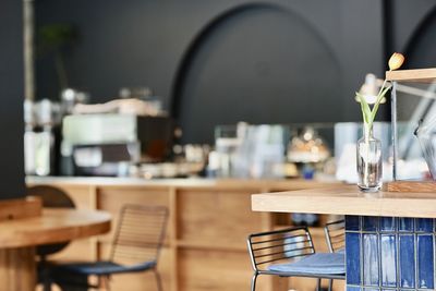 Empty chairs and table in restaurant