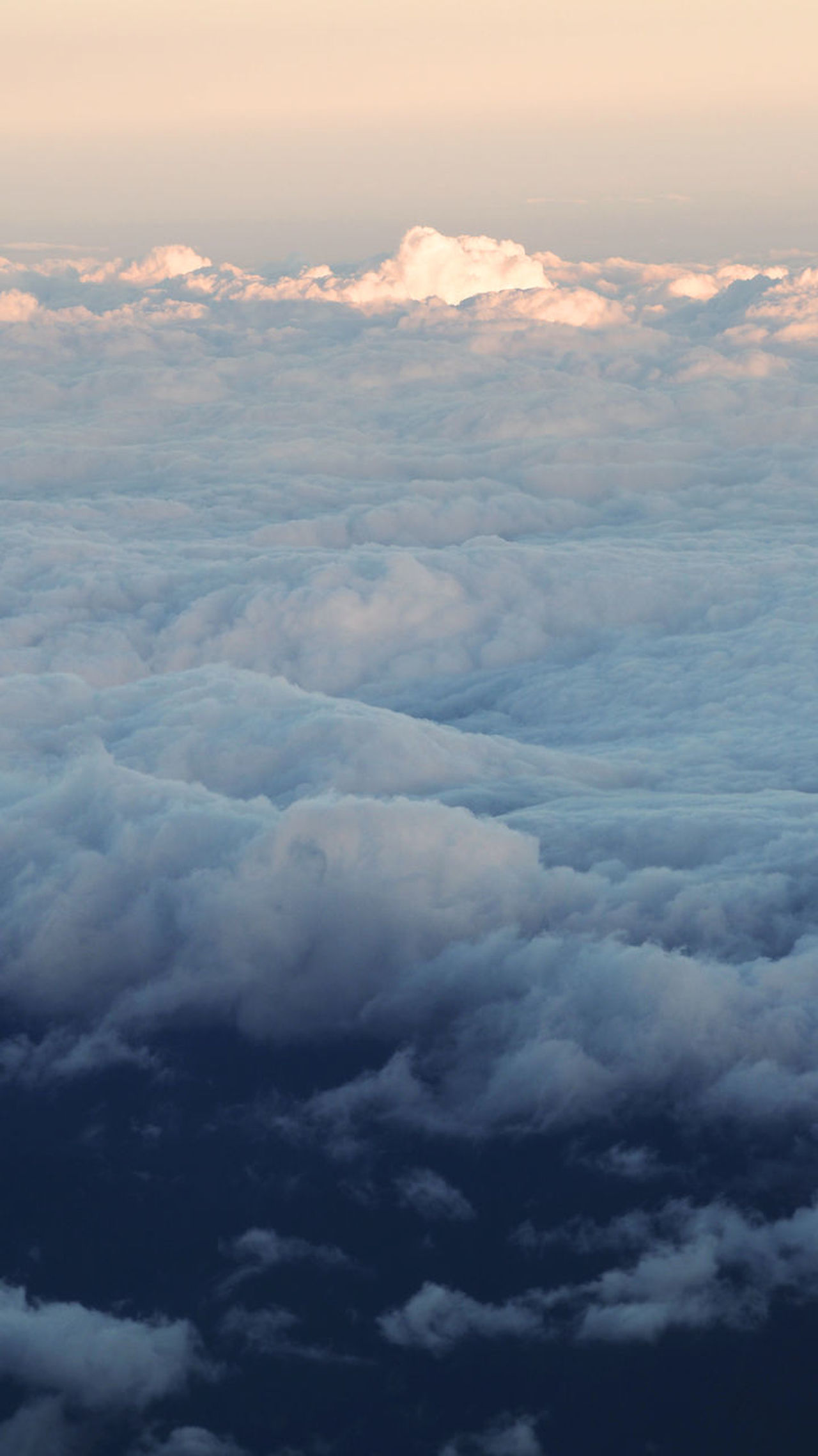 Clouds; sky; view; cloudscape; sun; cloud; beautiful; above; airplane; sunny; background; aerial; white; horizon; blue; fluffy; heaven; over; cloudy; atmosphere; window; nature; bright; freedom; eye; weather; sunlight; air; top; flight; light; travel; pla