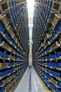 High angle view of automated warehouse. plastic boxes put in the pallet in shelf rack in warehouse.