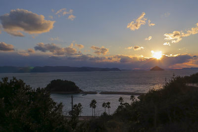 Scenic view of sea against sky during sunset