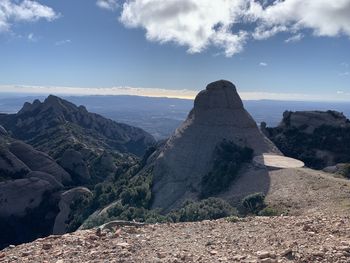Scenic view of rocky mountains against sky