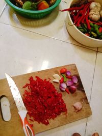 High angle view of chopped vegetables on cutting board