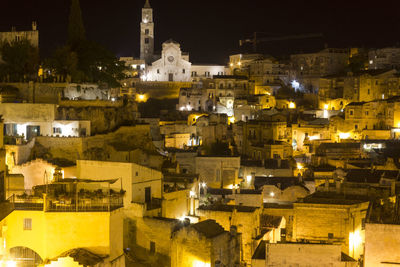 High angle view of illuminated buildings in city