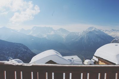 Scenic view of snowcapped mountains against sky