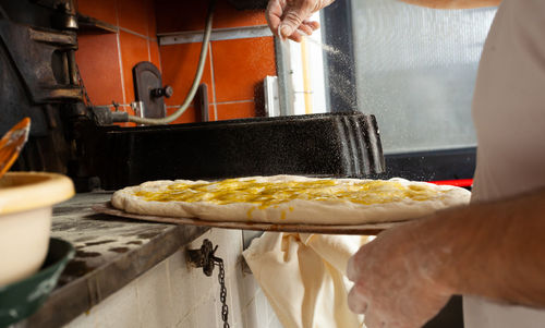 Schiacciata is a kind of bread made in tuscany, italy.