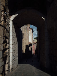 View of alley amidst building