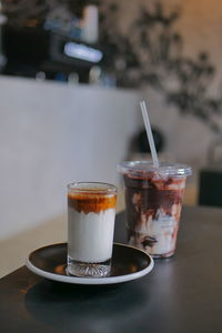 Close-up of coffee in glass on table