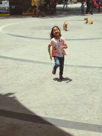 Full length of girl standing on floor