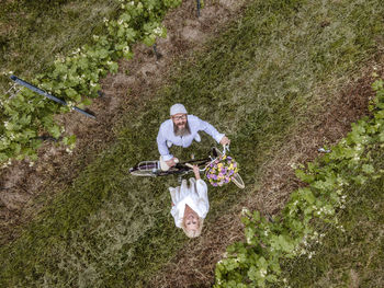 High angle view of man with umbrella on land