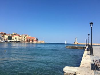 Scenic view of sea against clear blue sky