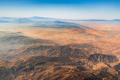 Aerial view of dramatic landscape against sky