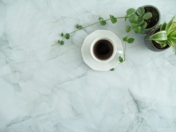 High angle view of coffee cup on table