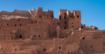 BUILDINGS AGAINST BLUE SKY