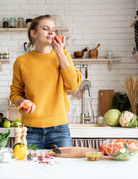 Full length of woman in restaurant at home